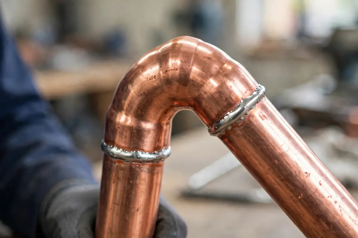 Copper pipe elbow joint close up